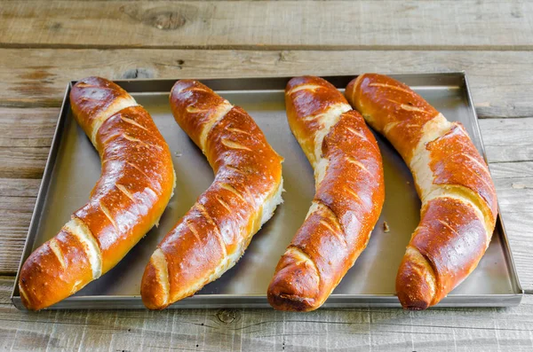 Bavarian rolls in a metal bowl — Stock Photo, Image