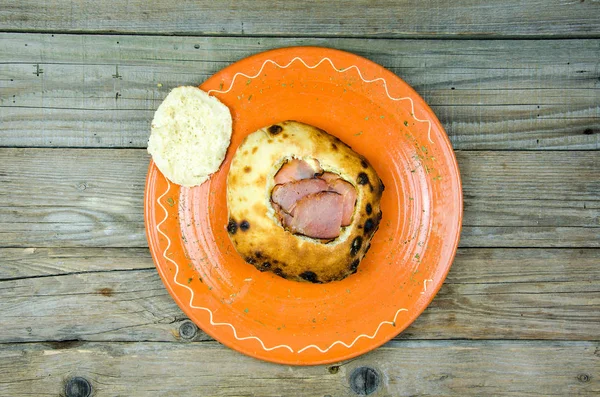 Bread stuffed with prosciutto and cream cheese — Stock Photo, Image