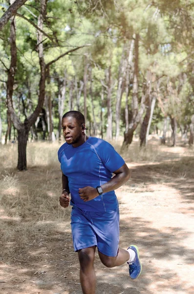 Athletic black man running