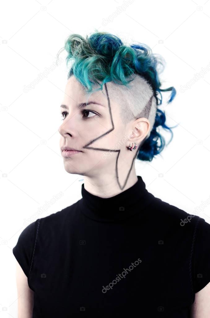 Punk hairstyles on a white background, portrait of a girl with crazy hair in green and blue shades