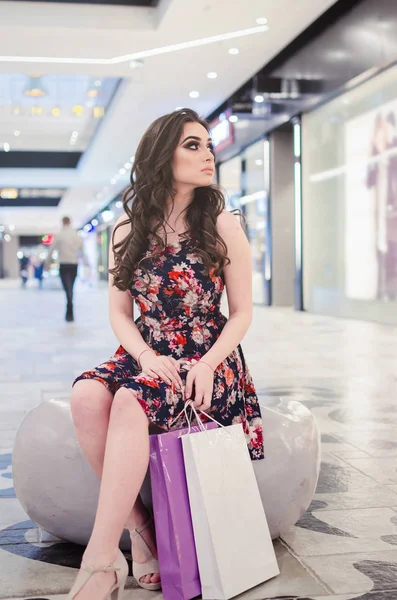 Beautiful Young Woman Shopping Bags Sitting Hall Waits — Stock Photo, Image