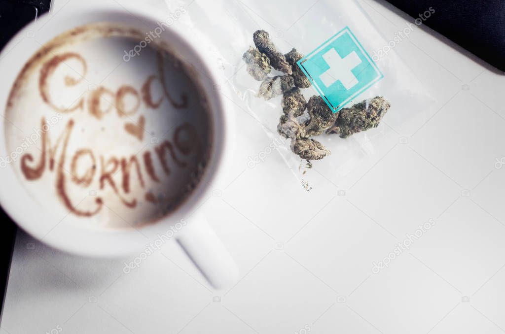  morning coffee with marijuana isolated on white background