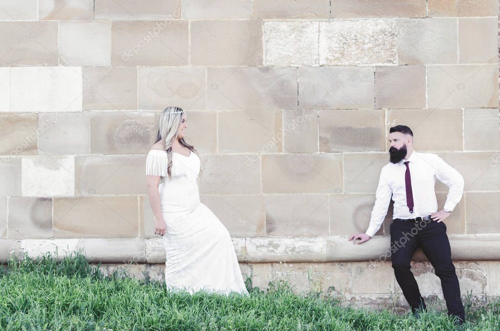 Stylish young couple walking on european  streets 