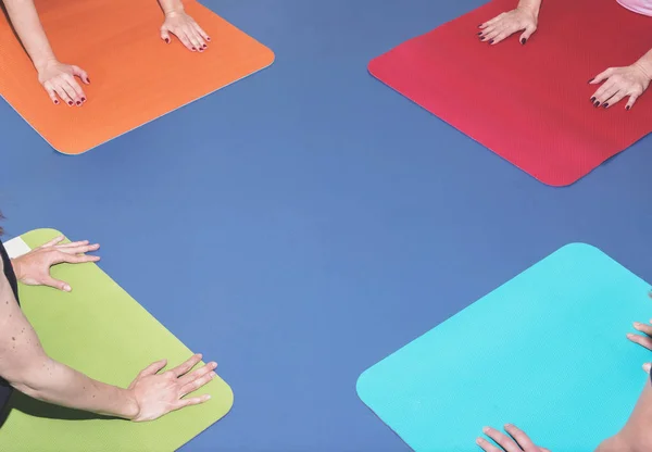 Cropped Image Four Multicolored Mats Women Hands Exercise Studio — 스톡 사진