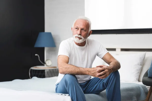 Senior Man Beard White Hair Sitting Alone Bed Morning Pajamas — Stock Photo, Image