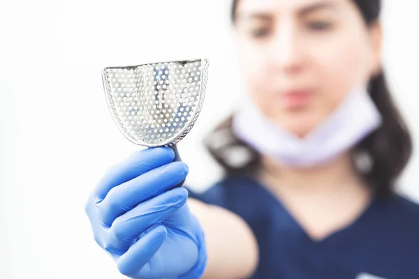 Background Blurred Nurse Dental Office Hold Metal Denturest — стоковое фото