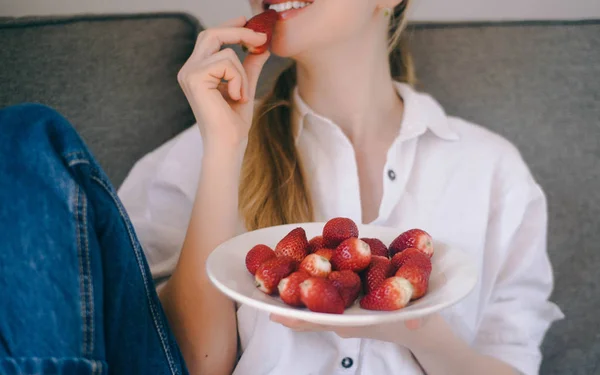 happy healthy vegan woman eating natural clean eating desert at
