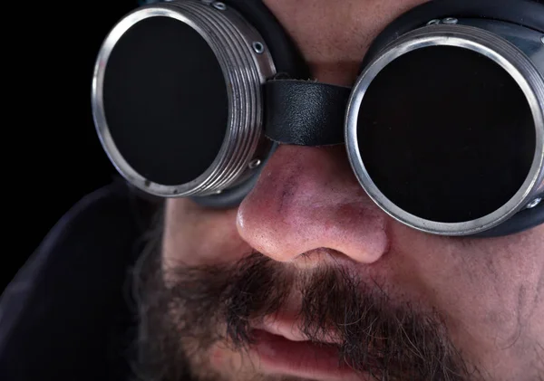 Bearded man with welding goggles - closeup — Stock Photo, Image