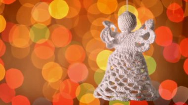 arka plan bulanık asılı rocheted Noel melek dekorasyon ışıklar 