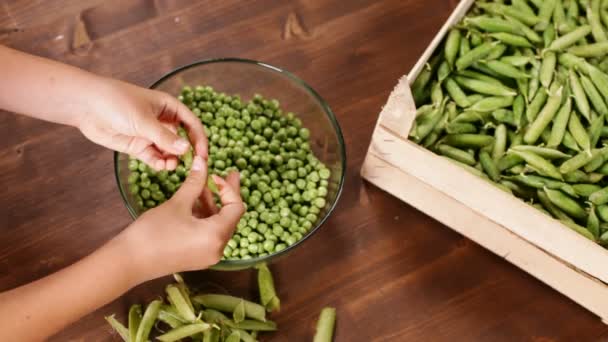 Close Female Hands Taking Pods Wooden Box Shelling Peas Glass — Stock Video