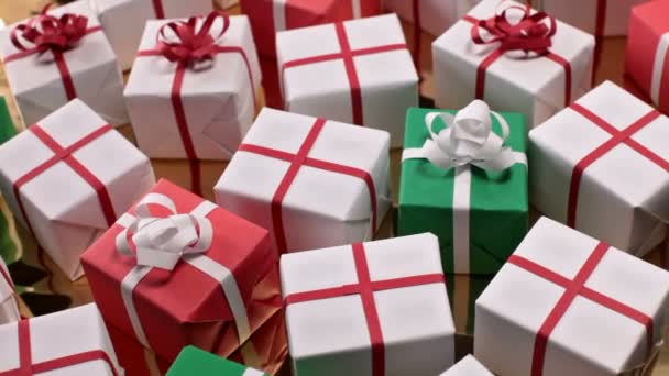 View Movement Wrapped Present Boxes White Red Ribbons Golden Surface — Stock Video