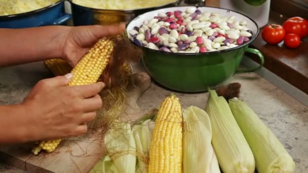 Close Female Hands Husking Cleaning Sweet Corn Cobs Table — Stock Video