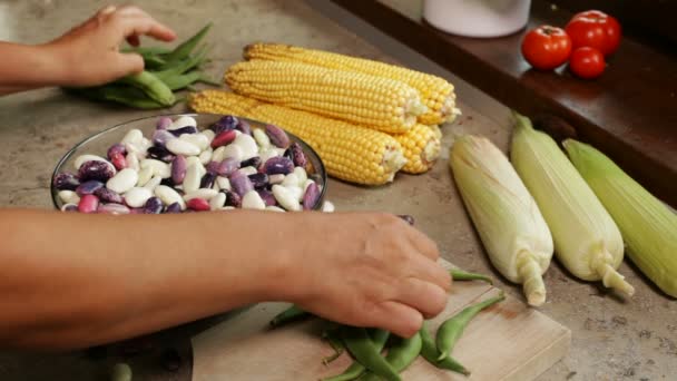 Close Female Hands Shelling Fresh Colorful Beans Glass Bowl Corn — Stock Video