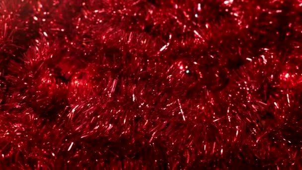 Close Movement Red Christmas Tinsel Garland — Stock Video