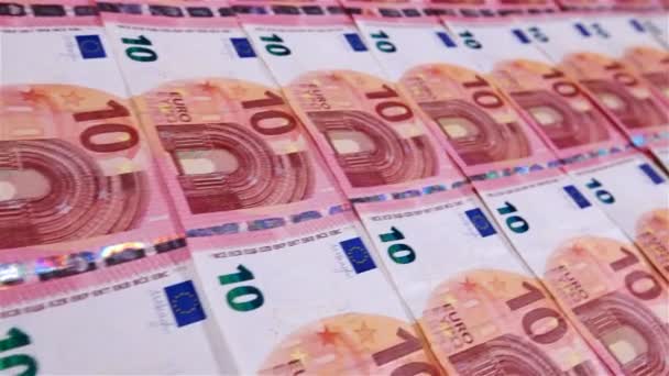 Zblízka Pohybu Podél Deset Euro Bankovky Vrstvy Uspořádány Řádcích — Stock video