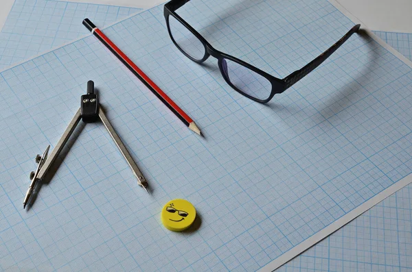 Compass Pencil Eraser Points Blue Graph Paper Sketching — Stock Photo, Image