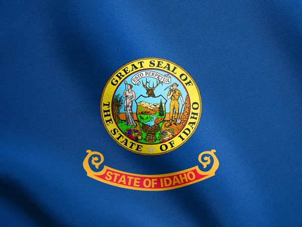 Bandeira de Idaho acenando com textura de tecido — Fotografia de Stock