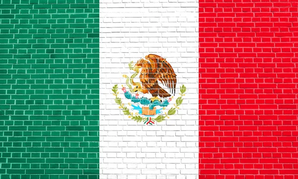 レンガの壁のテクスチャの背景にメキシコの旗 — ストック写真