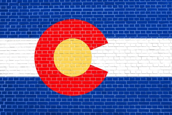 Прапор Колорадо з цегляною текстурою стіни фону — стокове фото