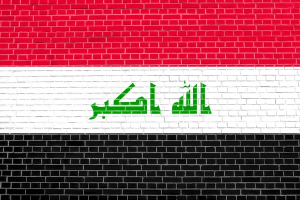벽돌 벽 텍스처 배경에 이라크의 국기 — 스톡 사진