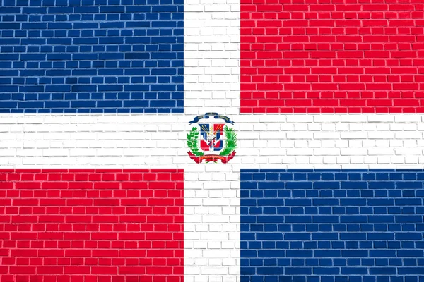 Dominikanska republiken flagga på tegelvägg konsistens — Stockfoto