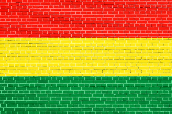 Tuğla duvar doku arka plan üzerinde Bolivya Bayrağı