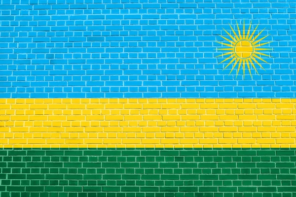 Bandeira de Ruanda na parede de tijolo textura fundo — Fotografia de Stock