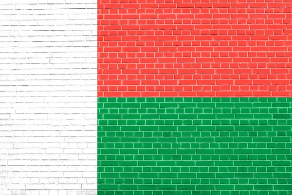 Bandera de Madagascar, fondo de textura de pared de ladrillo — Foto de Stock