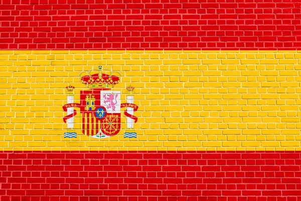 Spaniens flagga på tegelvägg textur bakgrund — Stockfoto