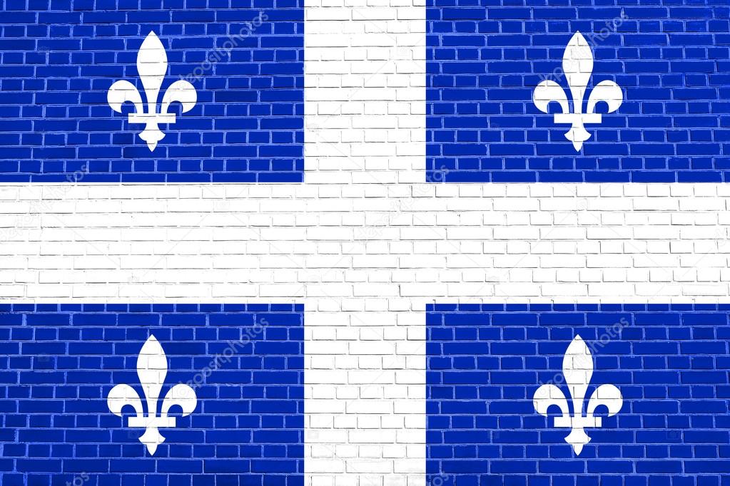 Flag of Quebec on brick wall texture background