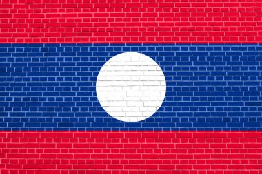 Tuğla duvar doku arka plan üzerinde Laos Bayrağı