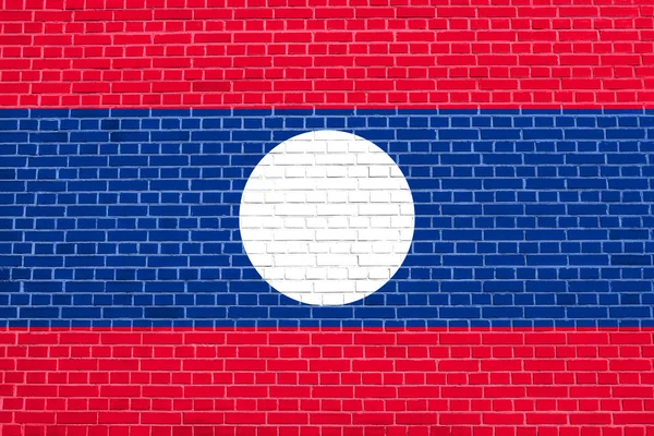 Bandeira do Laos no fundo textura parede de tijolo — Fotografia de Stock