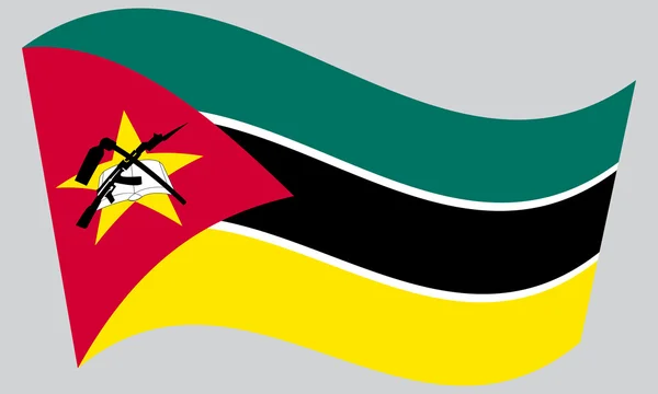 Flagge von Mosambik weht auf grauem Hintergrund — Stockvektor