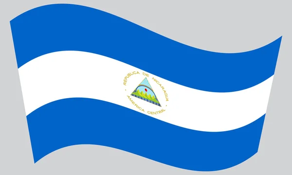 Flag of Nicaragua waving on gray background — Stock vektor