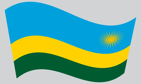 Bandera de Ruanda ondeando sobre fondo gris — Vector de stock
