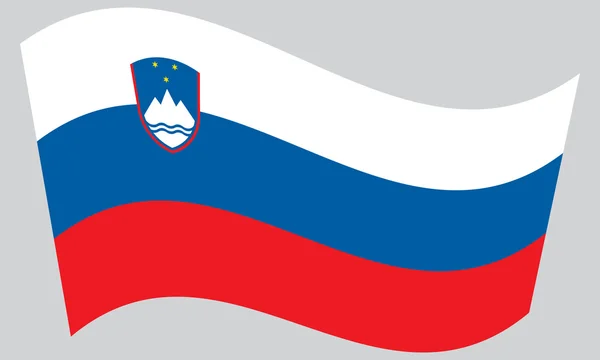 Flag of Slovenia waving on gray background — ストックベクタ
