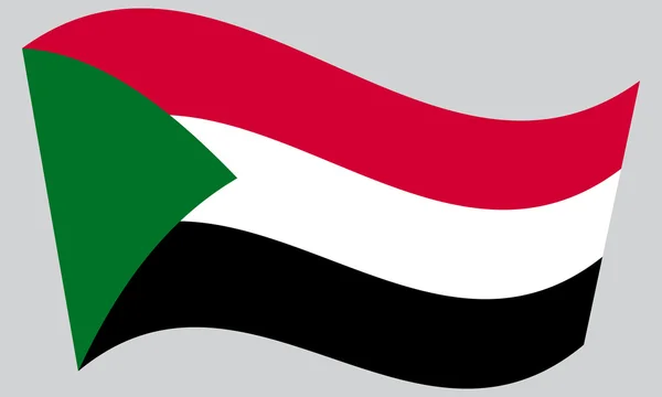 Bandera de Sudán ondeando sobre fondo gris — Vector de stock