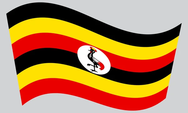 Flagge Ugandas weht auf grauem Hintergrund — Stockvektor