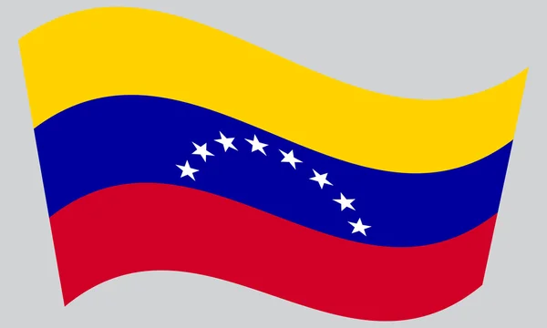 委内瑞拉在灰色的背景上挥舞着的旗子 — 图库矢量图片