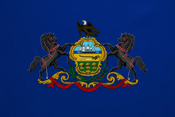 Flag of Pennsylvania real detailed fabric texture — Stock fotografie