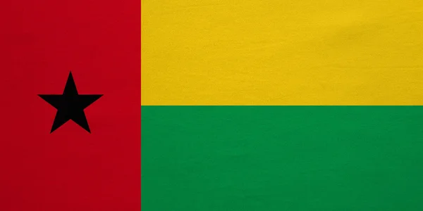 Flagge von Guinea-Bissau echte detaillierte Textur — Stockfoto