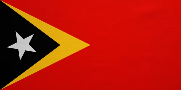 Vlag van Oost-Timor onroerend gedetailleerde textuur van de stof — Stockfoto