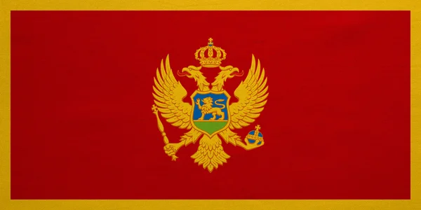 Flag of Montenegro real detailed fabric texture — ストック写真