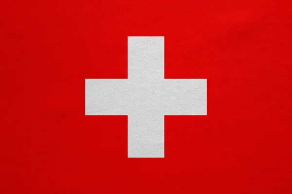 Flag of Switzerland real detailed fabric texture — Stock fotografie