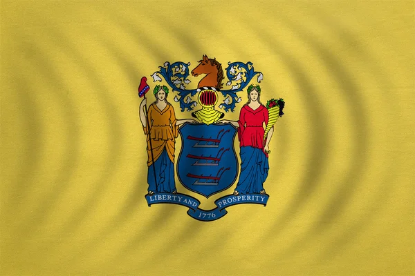 Vlajka New Jersey vlnité podrobné textilie textura — Stock fotografie