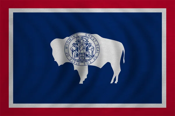 Bandera de Wyoming ondulada textura de tela detallada — Foto de Stock