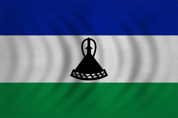 Bandera de Lesotho ondulada, textura de tela detallada real —  Fotos de Stock