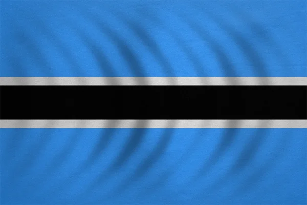 Flagga av Botswana vågiga riktigt detaljerade tyg textur — Stockfoto