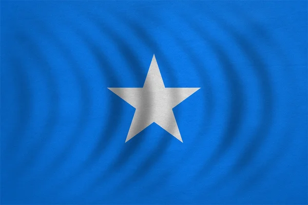 Flagga av Somalia vågiga, riktigt detaljerade tyg textur — Stockfoto