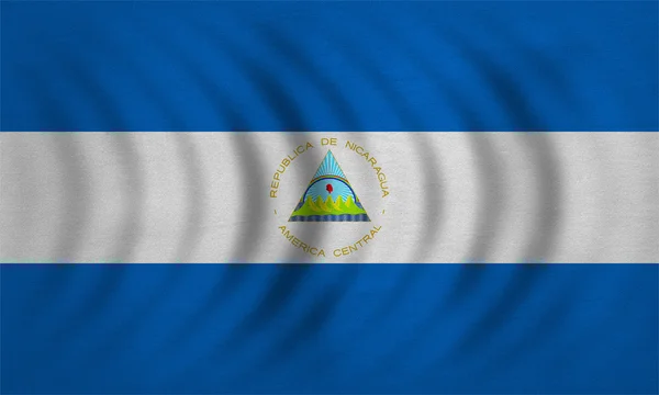 Флаг Никарагуа волнистый, детализированная текстура ткани — стоковое фото